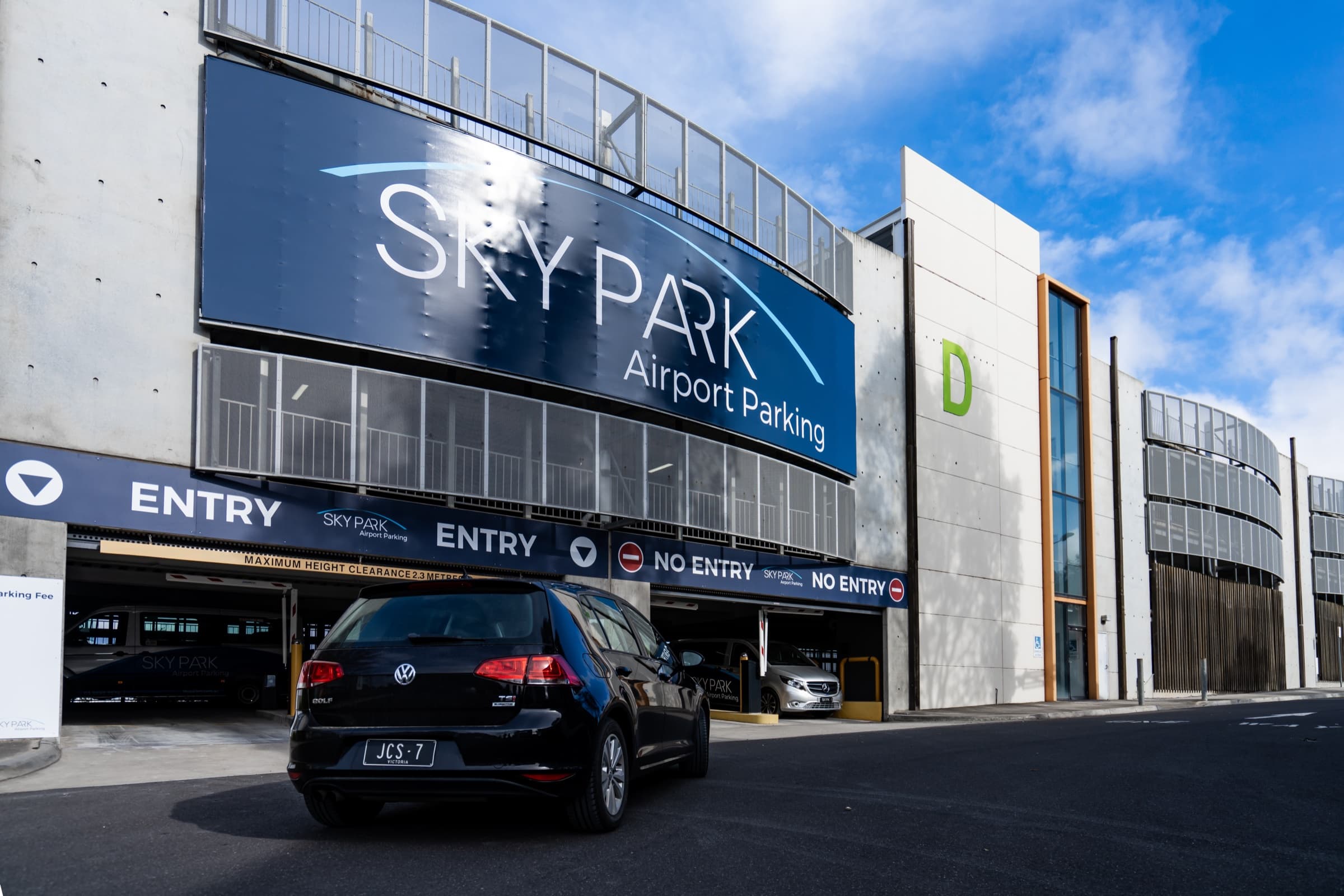 SkyPark Melbourne Airport Parking facility entrance — purpose-built multi-level secure car park with controlled vehicle gates and licence-plate-recognition entry